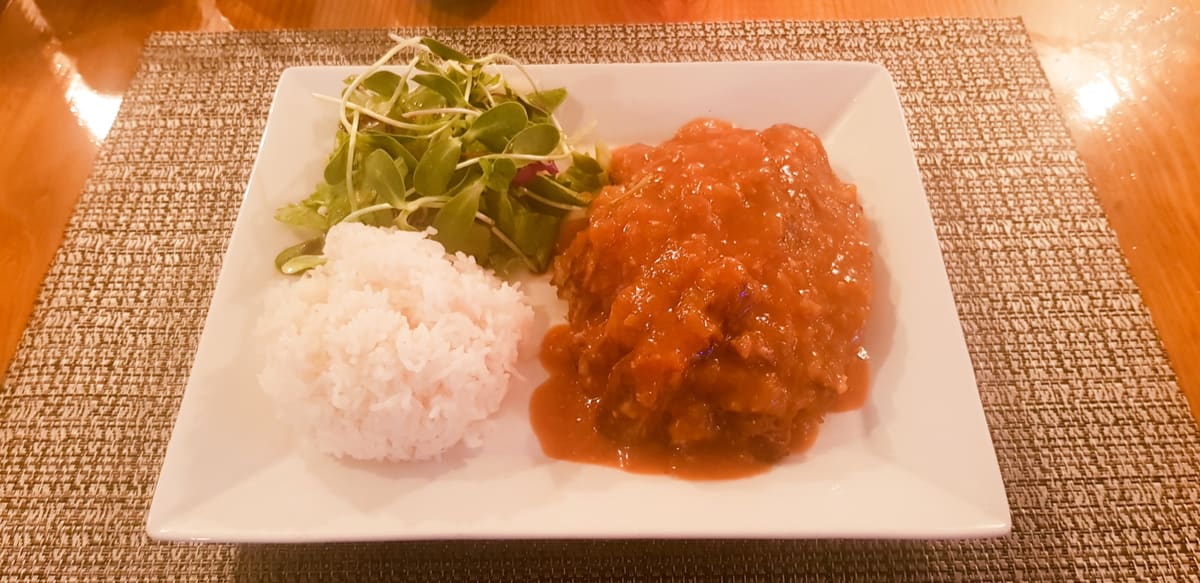 Babi Pangang in red sweet-and-sour sauce served with rice